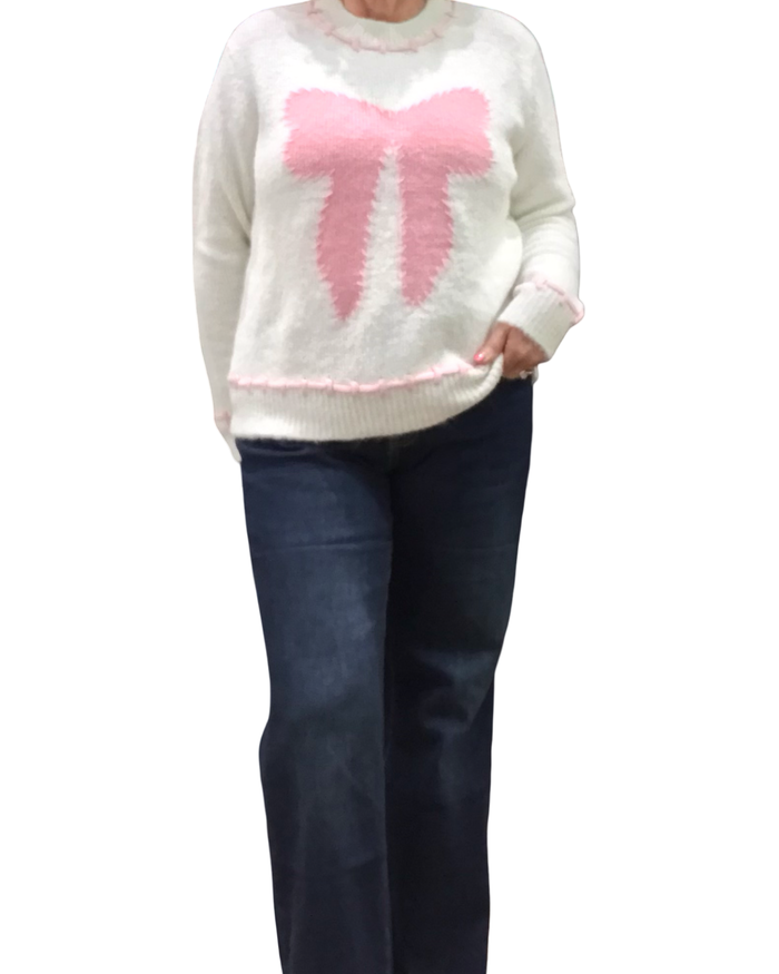 Chandail col rond blanc en tricot avec une boucle devant