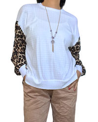 Chandail à manche blanc cassé avec les manches imprimées léopard