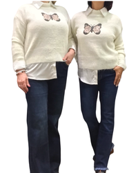 Chandail col montant off White en tricot avec un appliqué de papillon