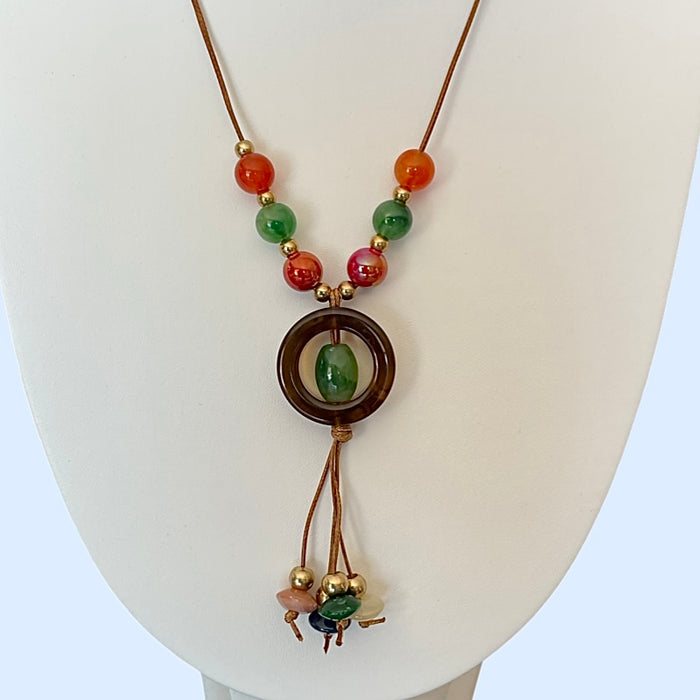 Bijoux | Collier en babiche brune avec pendentif en forme de cercle brun