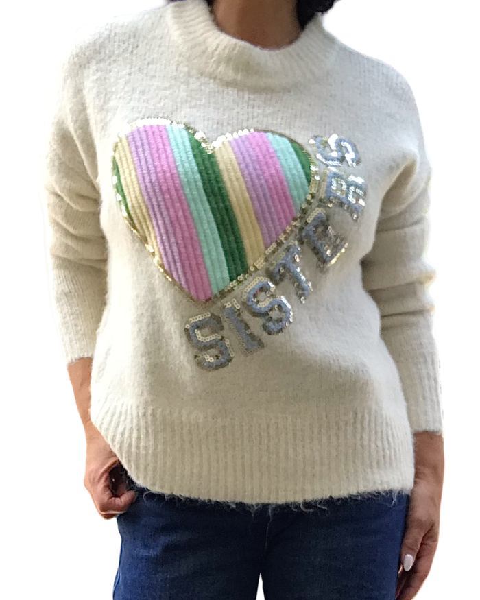 Chandail col montant off white en tricot avec un appliqué de cœur arc-en-ciel
