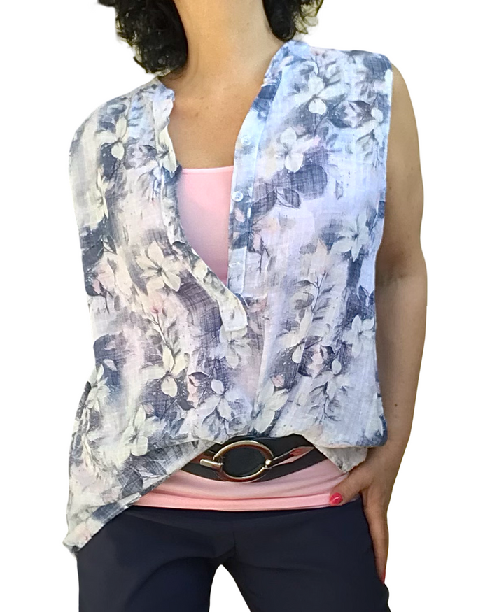 Blouse blanche sans manche fleurie – Élégance d’été