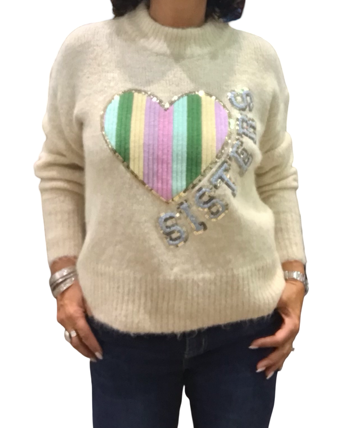 Chandail col montant beige en tricot avec un appliqué de cœur arc-en-ciel