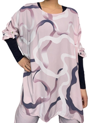 Blouse rose over size pour femme à motifs avec chandail à manche longue.