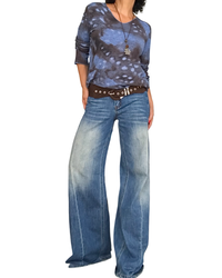 Jeans palazzo bleu avec surpiqûre le long de la jambe