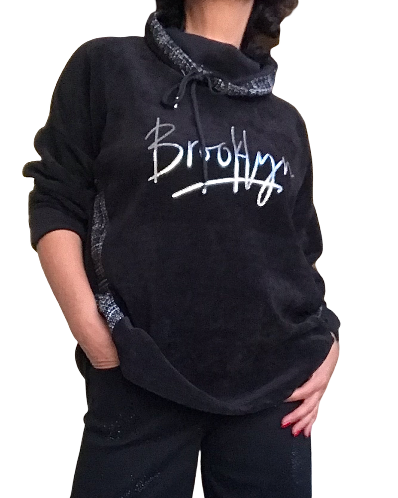 Chandail col cheminé en velours noir