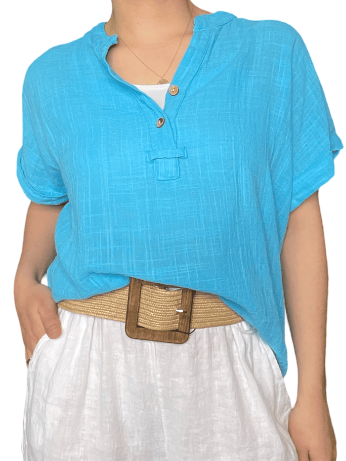 Blouse turquoise unie pour femme avec ceinture en jute.
