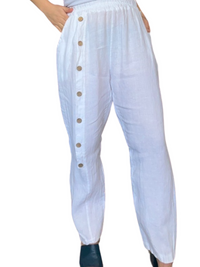 Pantalon droit blanc pour femme en lin à taille élastique.