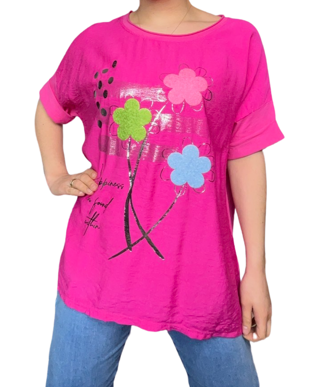 T-shirt fuchsia avec imprimé de fleurs texturées.